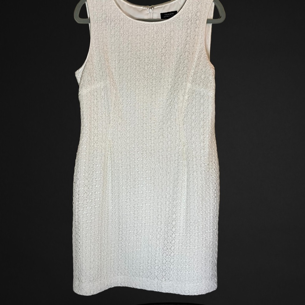 Tahari White Sleeveless Sheath dress Size 12 / Worn once Small eyelet de…